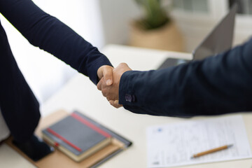 Close agreement shaking hands