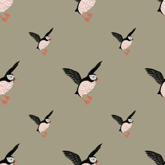 Minimalistic seamless pattern with black doodle puffin bird shapes. Beige background. Pastel palette artwork.