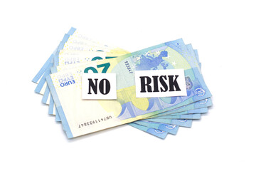 No risk words letters and euro banknotes . Low investment risks business concept.