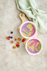 Fototapeta na wymiar Breakfast Acai smoothie bowles with chia seeds and strawberries