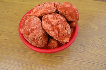 Pure jaggery in a bowl up front view