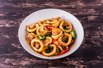Spicy fried squid with basil leaves