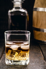 glass of aged whiskey, grain distilled alcohol, with malt, aged in barrels