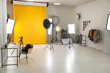 Interior of modern photo studio with professional equipment