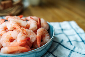 Peeled shrimps in a bowl, macro view