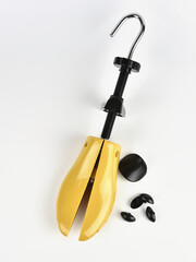Wooden shoe lasts on a white background.
