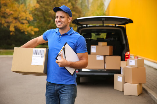 Courier with clipboard and parcel near delivery van outdoors. Space for text
