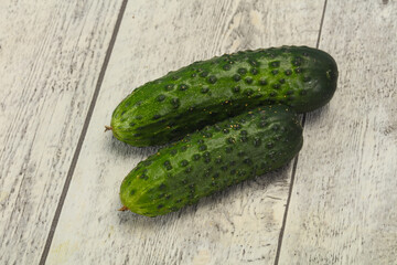 Ripe fresh green two cucumbers