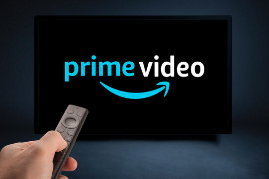 USA, NEW YORK February 2, 2021: Nvidia Sheild TV Remote in Hand and TV Screen with Amazon Prime Video Logo, Amazon Prime Video is a well known global provider of streaming movies