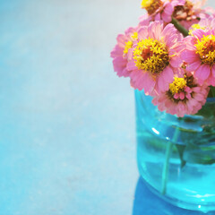 Light and airy Zinnia flower bouquet, fresh flowers for spring season background with copy space.