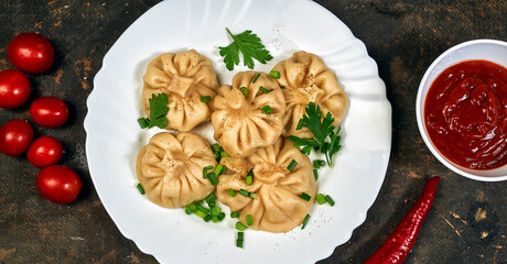 Traditional Georgian khinkali in a plate