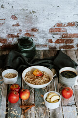 A porridge bowl with apples and cinnamon, food still life, healthy breakfast