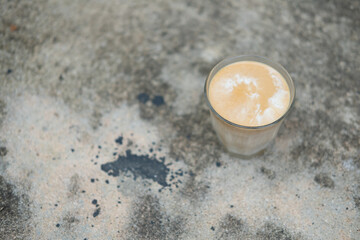 Close up of Dirty Latte coffee with dirty texture on the coffee table