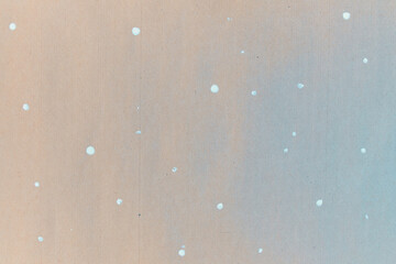 Texture of gift wrapping paper. Abstract drawing on craft paper for surprises. White dots in the...