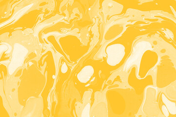 Yellow luxury marble ink texture on watercolor paper background. Marble stone image. Bath bomb effect. Psychedelic biomorphic art.