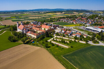 Aerial view of the village and monastery Oberalteich in Germany, Bavaria on a sunny day in spring	