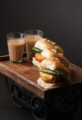 Masala cutting chai and Bombay vada paav is an indian burger. Potato patty is deep fried in gram...