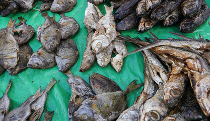 Dry fish displayed on food market at Ranohira, Madagascar, closeup detail