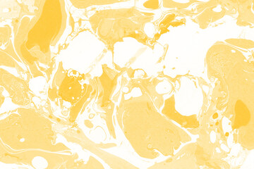 Yellow luxury marble ink texture on watercolor paper background. Marble stone image. Bath bomb effect. Psychedelic biomorphic art.