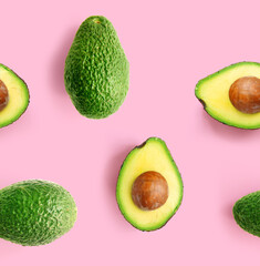 Pattern with avocado on pink background. Tropical abstract background.