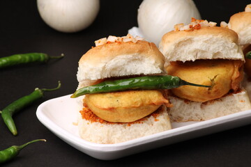 Bombay vada paav is an indian burger. Potato patty is deep fried in gram flour or besan batter and it is served hot with paav or bun like sandwich. Its available and liked all over India