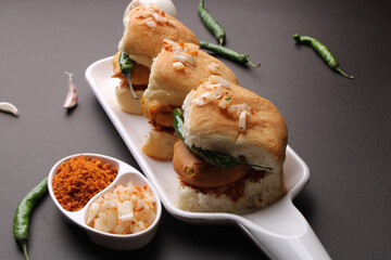 Bombay vada paav is an indian burger. Potato patty is deep fried in gram flour or besan batter and it is served hot with paav or bun like sandwich. Its available and liked all over India