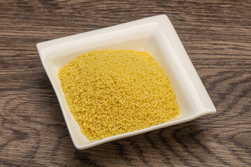 Raw cous cous heap in the bowl