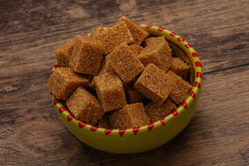 Cane sugar cubs in the bowl