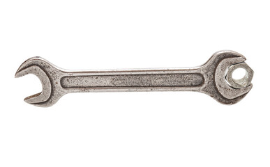 Old metal wrench close up isolated on white background