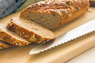 Sliced sourdough bread. A chopped loaf of homemade bread 
