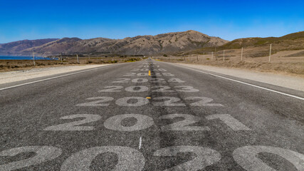 2020-2030 written on highway road to the mountain