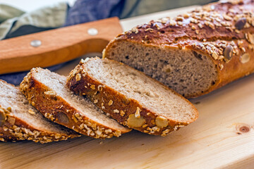 Sliced sourdough bread. A chopped loaf of homemade bread 