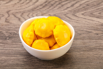 Marinated patissons in the bowl