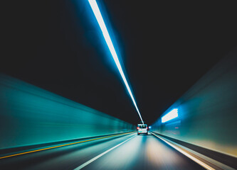 blurred modern underground tunnel in long exposure showing speed