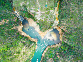 Aerial view of the tourist boats at the waterfall of the Canyons of Furnas at Capitólio - MG,...
