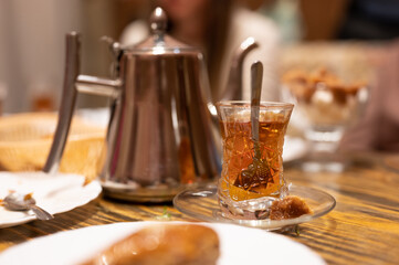 Black tea ceremony. Hot turkish tea in glass