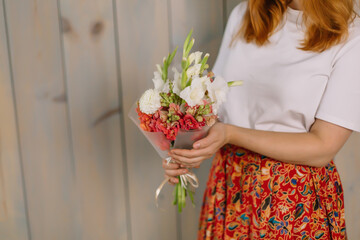 woman holding bouquet of flowers nature