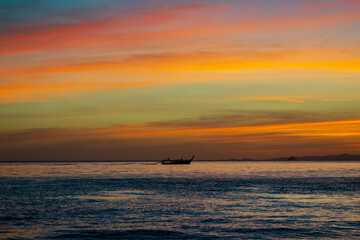 Naklejka na ściany i meble Sunset on Ao Nang beach Krabi province Thailand