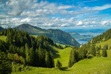 Picturesque view on green mountains as seen from Klewenalp, Switzerland
