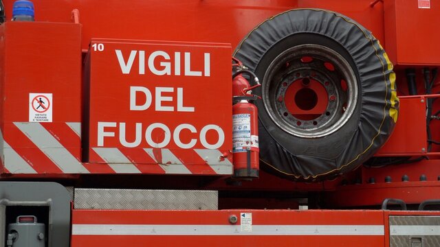 Europe, Italy, Milan February 2021  - Italian fire station with red  emergency vehicle truck ( vigili del fuoco )
