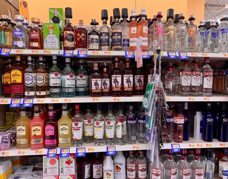 Several Bottles Of Liquor On A Store Shelf