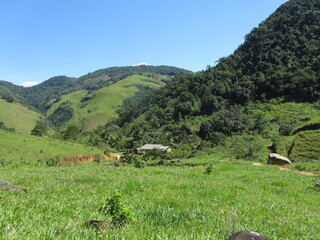 Fototapeta na wymiar typical rural landscape in Brazil, with green hills 