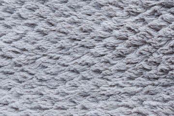 grey faux fur squares on the background