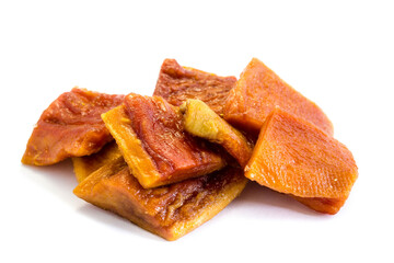 dried papaya pieces on white background