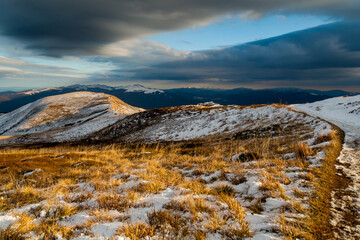 
The golden hour in the mountain pastures in the Bieszczady Mountains after the first snowfall /
Sunset in the mountain pastures in the Bieszczady Mountains