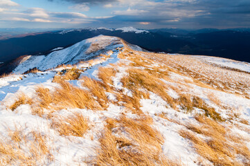 
The golden hour in the mountain pastures in the Bieszczady Mountains after the first snowfall /
Sunset in the mountain pastures in the Bieszczady Mountains