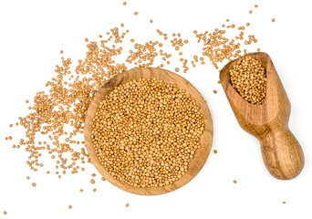 Mustard seeds in a wooden cup, top view