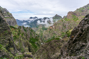 Cloud covered green mountain landscape on Madeira island