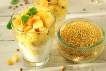 A dietary dessert made of millet with roasted apples and yoghurt