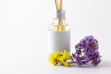 Incense sticks for home with floral scent. Flowers and dried flowers with aroma diffuser. Eco-friendly home fragrance concept